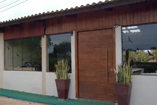 Aplicação de película arquitetônica para controle solar Cotia